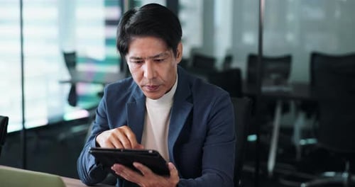 Tablet, report and thinking with businessman in office for administration, planning or research