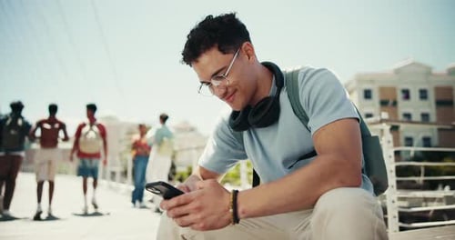 Happy, student and man in city with phone for music on travel to university, campus and college