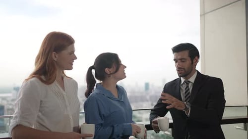 White collar worker meeting at high rise tower.