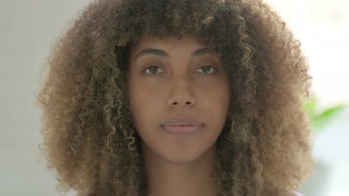 Close Up of African Woman Looking at the Camera