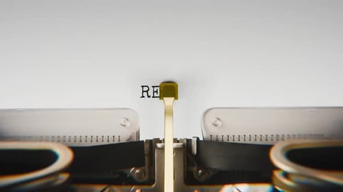 Old mechanical typewriter typing Reuse in a close-up view.