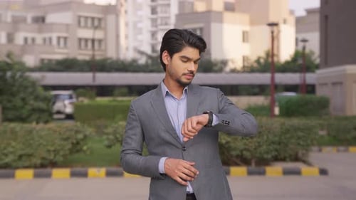 Indian Businessman Waiting For Someone