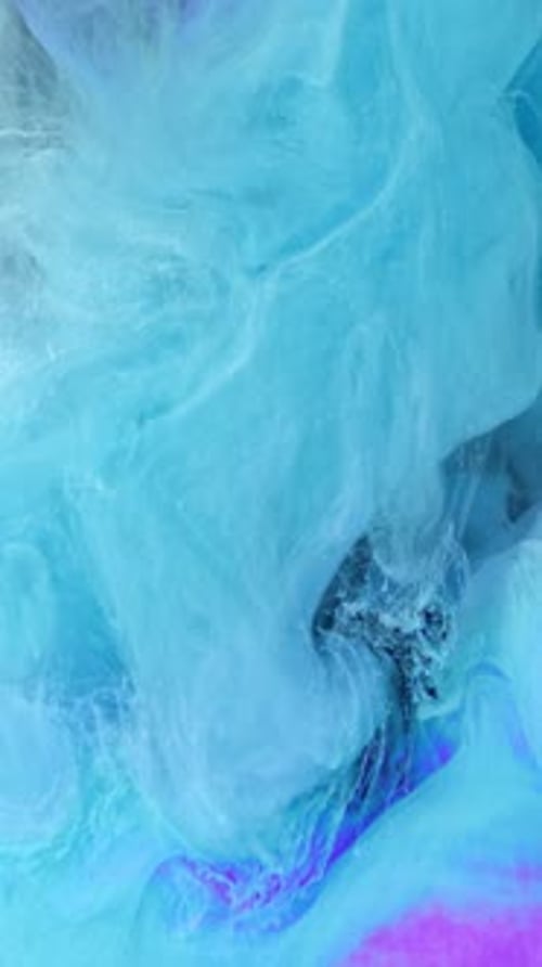 Abstract Swirling Light Blue and Pink Paint