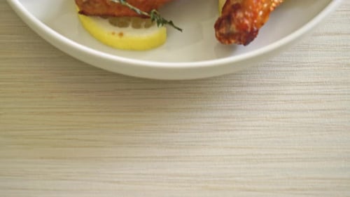 fried lemon pepper chicken wings with thyme