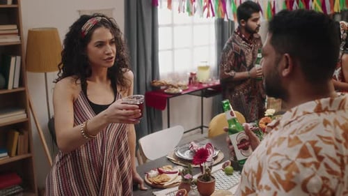 Friends Gather for a Colorful Indoor Birthday Celebration