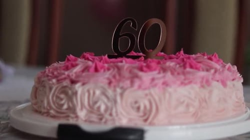 Pink Birthday Cake with Number Sixty Decoration