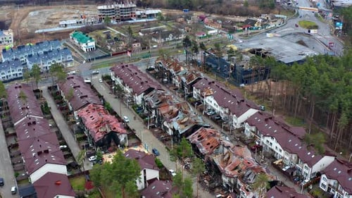 Top view of the road. Aerial view of the destroyed and burnt houses.