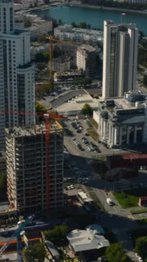 Top View of Construction of Building in City Center with Highrise Buildings Stock Footage Landscape