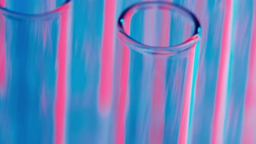 Close Up Video Neon Blue and Red Light Test Tubes in a Laboratory Scientific Experiment Research