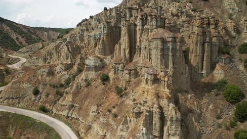 Pillar Rock Formations in Mountainous Landscape Aerial View