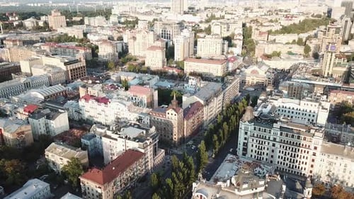 Ukraine, Kyiv, Drone Footage of a city view on a sunny day, camera turns from left to right.