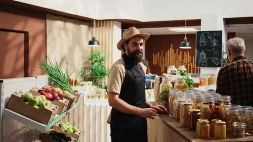 Bio Shop Vendor Adding Pantry Staples