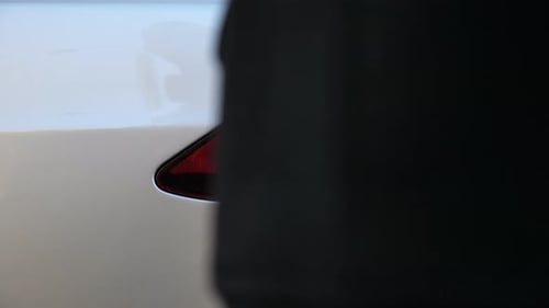 Charging An Electric Car with Charging Cord