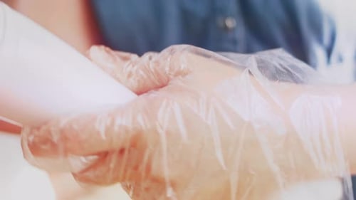 Hands Blending Strawberries for a Smoothie