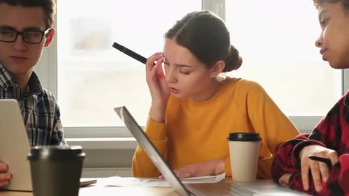Focused Female Team Leader Discuss Financial Statistics Brainstorming Business Meeting with Partners