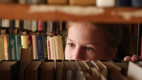Kid Girl Choose Books on Shelf of Old Library Schoolgirl Selecting Literature for Reading