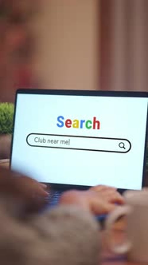 VERTICAL VIDEO OF WOMAN SEARCHING CLUB NEAR ME ON INTERNET