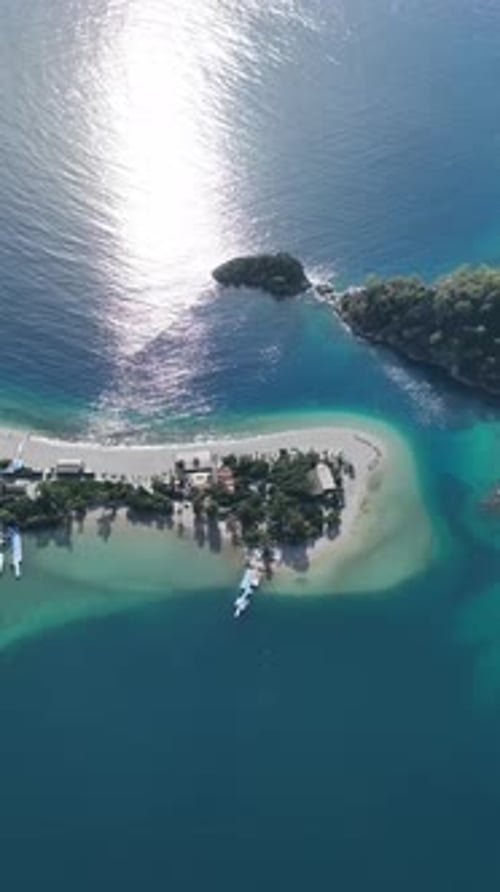Top down drone view of summer beach line