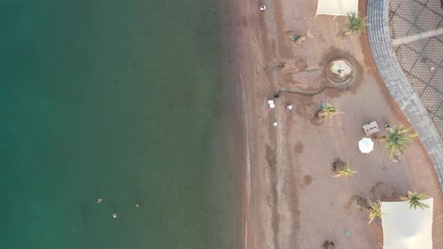 Carefree surface swimming at coral reef depths of Eilat princess beach aerial