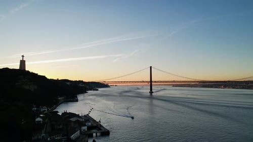 Sunset over Lisbon´s Ponte 25 de Abril bridge