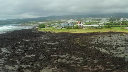 Seogwipo rocky coastline aerial view, Jeju Island, South Korea