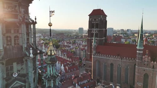 Aerial Video Shot By Drone Over the Historic Tourist Center of Gdansk the City Hall and the