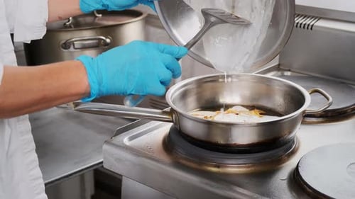 Chef cooking a delicious meal on the stovetop