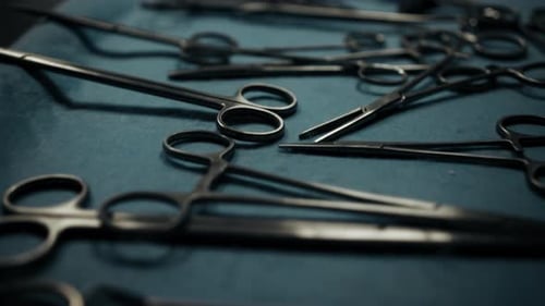 Surgical Scissors and Instruments Arranged on a Table