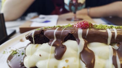 Slice of Chocolate Dessert with Strawberry Close Up