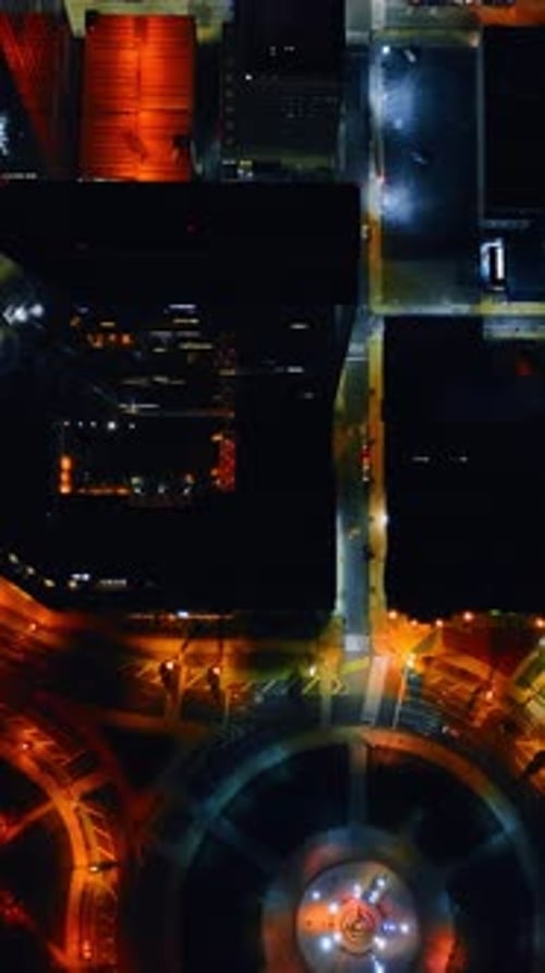 Highlighted streets and buildings in the cityscape of a night city. Top view on Philadelphia