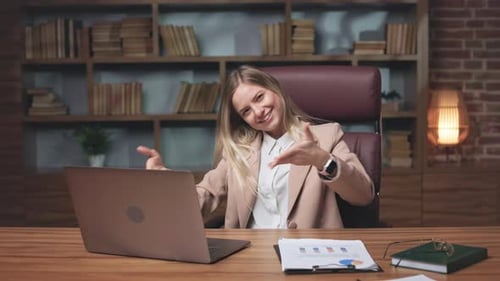 Friendly Assistant Welcoming Visitors in Modern Office