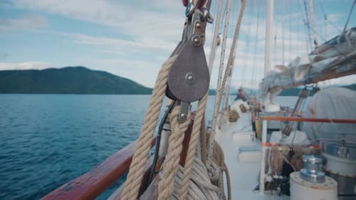 Sailing Boat Moves in the Sea and Arrives to the Tropical Island Area of the Town of Paraty Brazil
