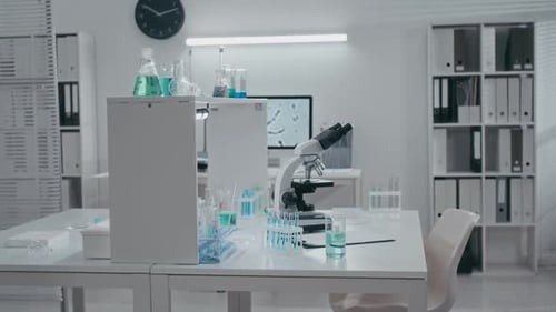 Clean Laboratory with Microscope and Test Tubes