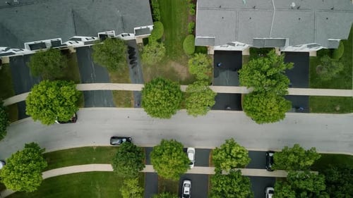 Aerial View of Peaceful Suburban Neighborhood on Sunny Day
