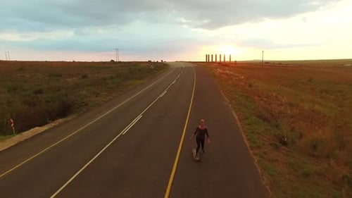 Magical Drone of Woman Traveler, Long Boarder Riding Her Long