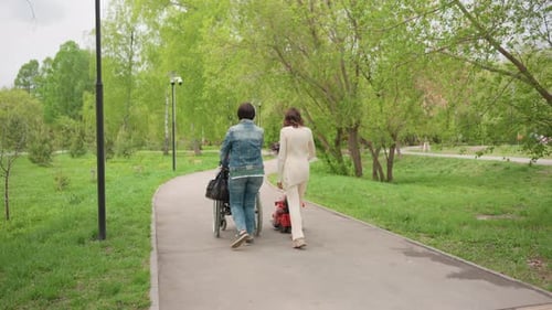Women Walk Together Friendly Group Enjoying Outdoor Stroll Peaceful Daytime Walk Featuring Women