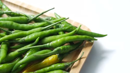 Close Up of Green Chili on a Chopping Board