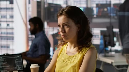 Portrait of Smiling Programmer Creating Machine Learning Models