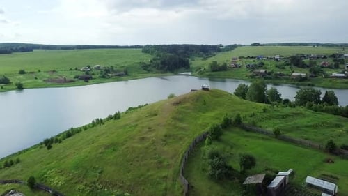 Breathtaking and Stunning Scenic Aerial View of a Serene Tranquil River and a Lush Green Landscape