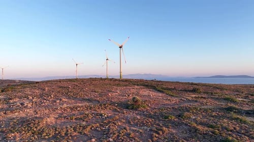 aerial view of wind mill on a sunny day