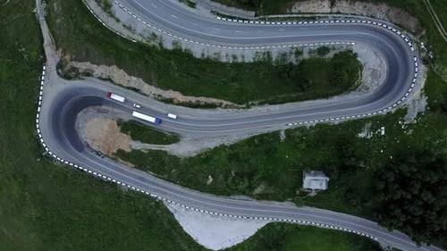 Above View of Cars Driving Along Highway and Landscape in Countryside Irrl