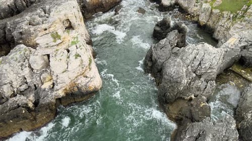 aerial sea waves rocks