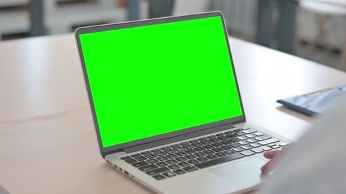 Doctor Using Laptop with Green Screen