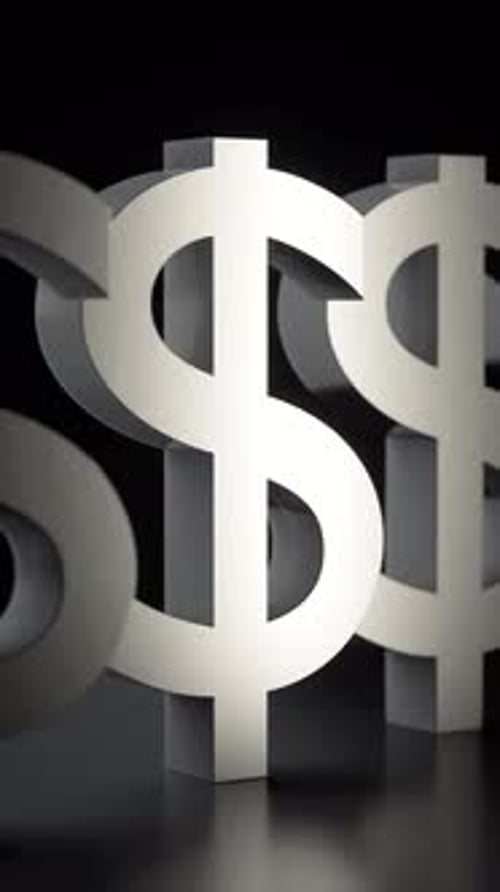 Vertical Video Slow Looping Pan Over a Line of Silver Dollar Symbols with High Contrast Lighting