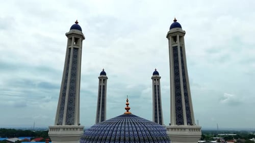 Panoramic view of Islamic Mosque with tower and beautiful sky