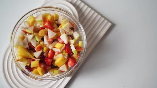 Vibrant Fruit Salad in Clear Bowl