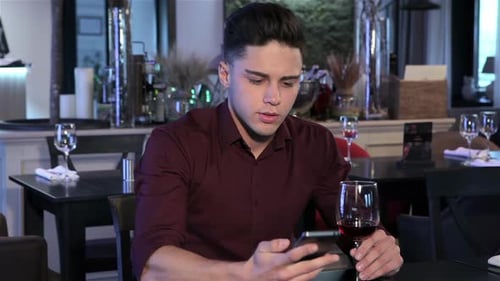 Guy Phones at the Restaurant