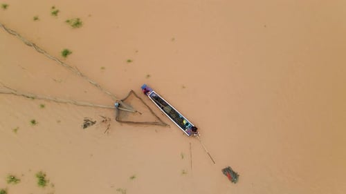 Boat Traveling Down a River