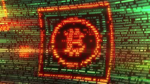 Bitcoin Symbol Emerging From Programming Code on Screen
