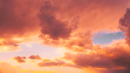 Beautiful Golden Sunset Sky with Soft Clouds